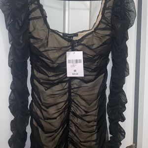 Black/nude knit dress